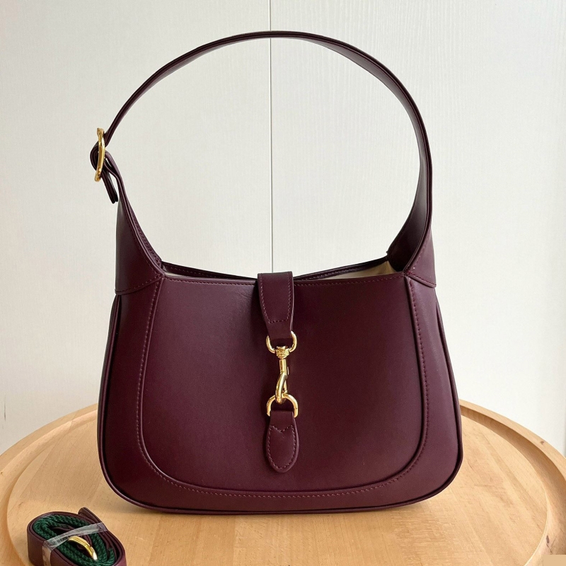 G*u*i top handle bags